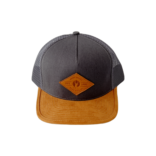 a suede brimmed snapback hat with a carbon color  a carbon color 